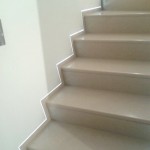 Steps with skirting boards flush with the wall and led lightScala con battiscopa filo muro e luce a led