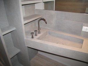 Photo shot on Vains and washbasin completely realized in Grigio TunisiParticolare sui vani ed il lavabo completamente realizzati in Grigio Tunisi